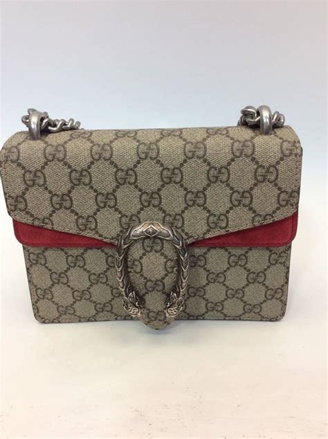 red gucci disco bag on person|Gucci bag with snake buckle.